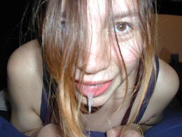 Young amateur teen with a full mouth..