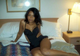 Black young cutie in beautiful lingerie